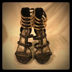 black and gold heeled sandals